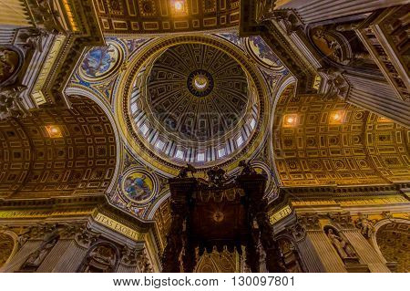 VATICAN, ITALY - JUNE 13, 2015: Dome and Baldacchino at St. Peter's Basilica in Vatican, beautiful structure and architecture.