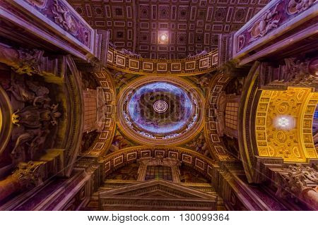 VATICAN, ITALY - JUNE 13, 2015: Roof nice view of Saint Peter Basilica at Vaticano city, the historic building that christians and all religions visit during all the year.