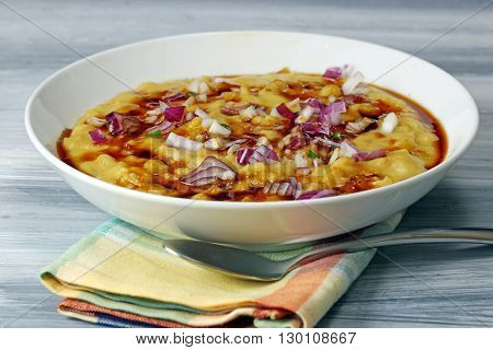 Martar Chaat or Ragda of Ragda Pattice with sweet tamarind sauce and onions