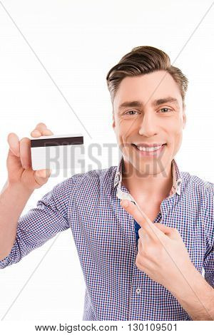 Portrait Of Happy Young Man Pointing On Bank Card