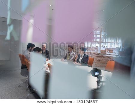 business people group brainstorming on meeting and businessman presenting ideas and projects oon laptop and tablet computer