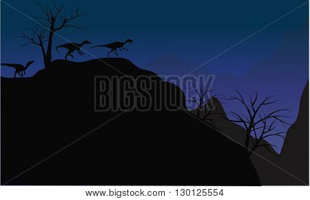 Silhouette of eoraptor in cliff at the night