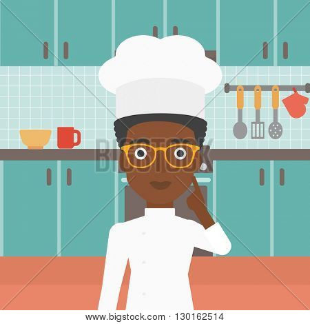 Chef pointing forefinger up.