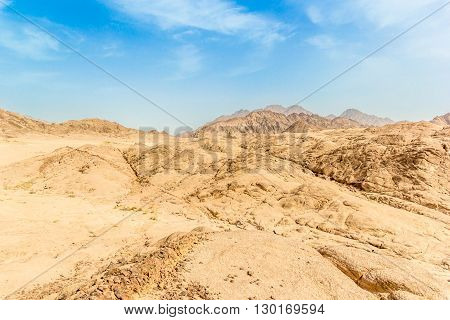 Photo with african mountain desert under blue sky