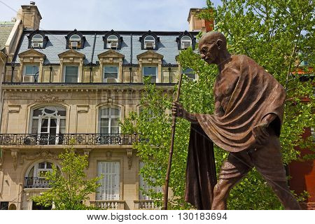 WASHINGTON DC USA - MAY 8 2016: A public monument of Mohandas Karamchand Gandhi installed in front of the Embassy of India in Washington DC on May 8 2016.
