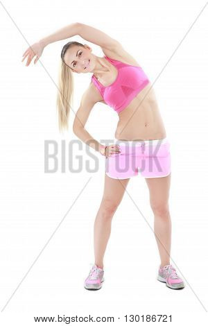 Portrait of young woman doing stretching exercise