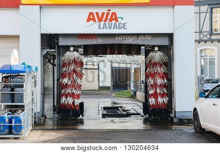 MULHOUSE FRANCE - DEC 19 2016: Automatic car wash in the center of the city of Mulhouse France - Avia Lavage auto - Avia car wash