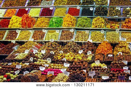 Sale of colorful cakes and sweets. Barcelona, Spain