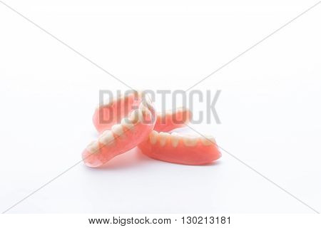 Full denture isolate on white background .