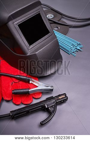 Welding equipment, welding mask, protective leather gloves, welding electrodes, high-voltage wires with clamps, cutting disc for grinder, set of accessories for arc welding.