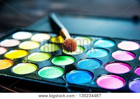 Makeup palette with makeup brush. Makeup background