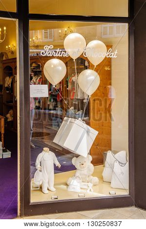 AIX-EN-PROVENCE FRANCE - JUL 17 2014: Tartine et Chocolate kids fashion store in the center of Aix city on a summer day on 10 rue d'Italie