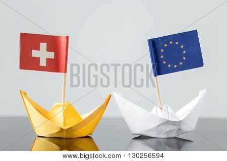 Paper Ship With Swiss And European Flag