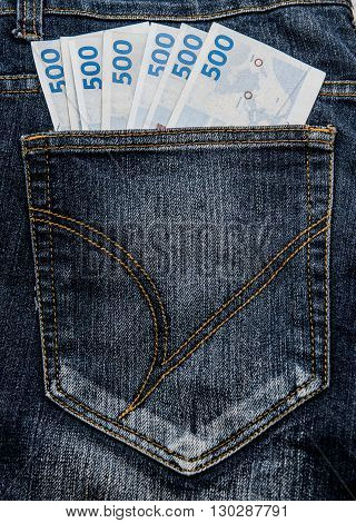 Jean pocket with some money, Danish currency