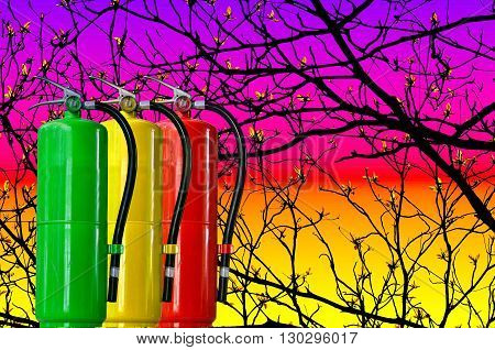 Many fire extinguisher tank on tree twings background