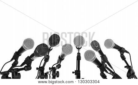 Several microphones prepared for press conference isolated on white