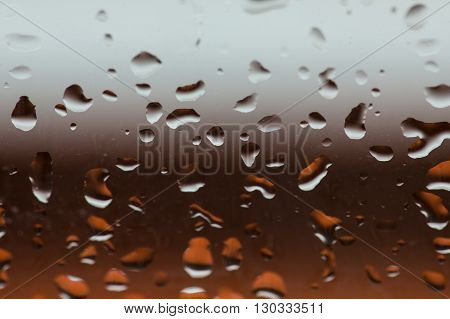 rain drops on the window with blurred background