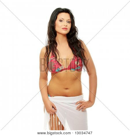Young sexy corpulent woman in swim suit, isolated on white background
