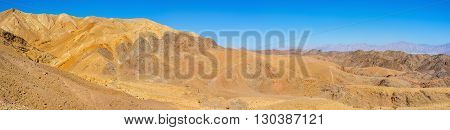 The desert Eilat mountains are popular tourist place with the scenic landscape and unusual color Israel.