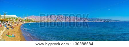 EILAT ISRAEL - FEBRUARY 23 2016: The view on beaches of Eilat and mountains of Jordan on February 23 in Eilat.