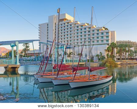 The sport yachts and the small drawbridge on the background Eilat Israel.