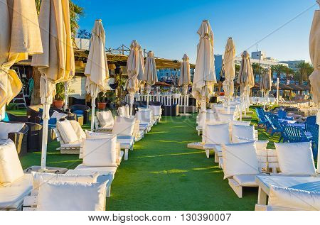EILAT ISRAEL - FEBRUARY 24 2016: The cozy restaurant on the central beach offers the local cuisine and beverages on February 24 in Eilat.