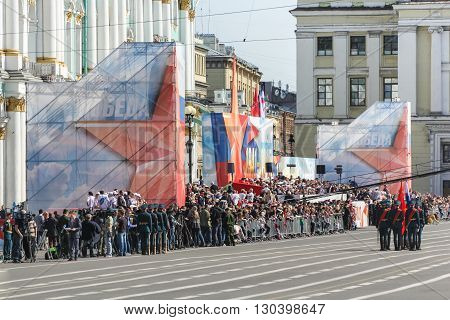 St. Petersburg, Russia - 9 May, Bearers group on Palace Square near the festive crowd, 9 May, 2016.
Festive military parade on the Palace Square in St. Petersburg.