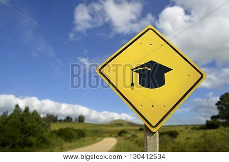 Education for all people access to schools in rural zone concept. Road sign with graduation cap icon on natural environment includes copy space.