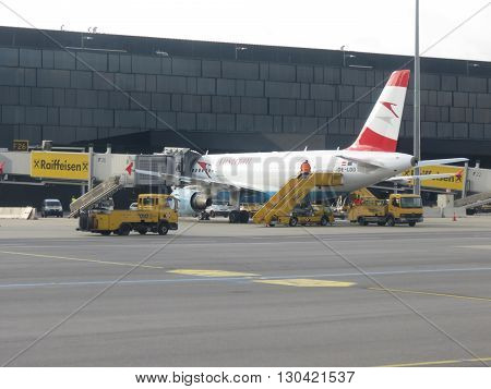 VIENNA SCHWECHAT AUSTRIA - CIRCA NOVEMBER 2014: Austrian Airlines aircraft at the airport