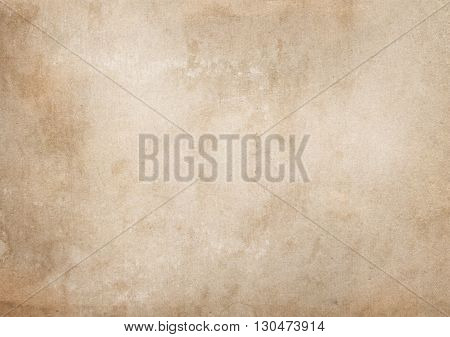 Aged paper background. Natural old stained paper texture for the design.