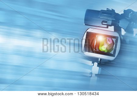 Video Documentary Background with Digital HD Camcorder and Copy Space.