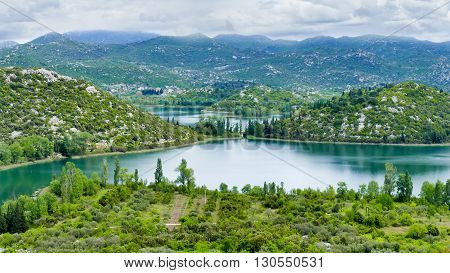 The lakes are part of a picturesque landscape and surrounded by mountains. They are situated between Makarska and Dubrovnik. It is a crypto-depression lake with its bottom below the surface of the sea.