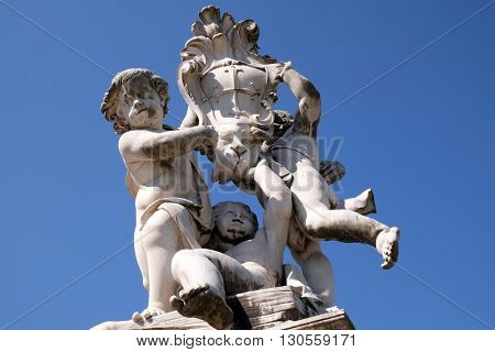 PISA, ITALY - JUNE 06, 2015: PISA, ITALY - JUNE 06, 2015: Fontana dei Putti on Piazza dei Miracoli with Angels in Pisa, Italy in Pisa, Italy, on June 06, 2015