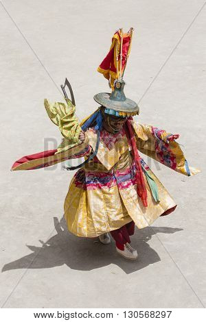 LAMAYURU INDIA - JUNE 13 2015: An unidentified buddhist lamas dressed in mystical mask dancing Tsam mystery dance in time of Yuru Kabgyat Buddhist festival at Lamayuru Gompa Ladakh North India