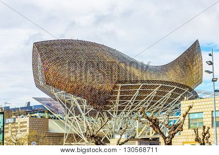 Golden Fish Sculpture In Port Olympic, Barcelona, Spain.