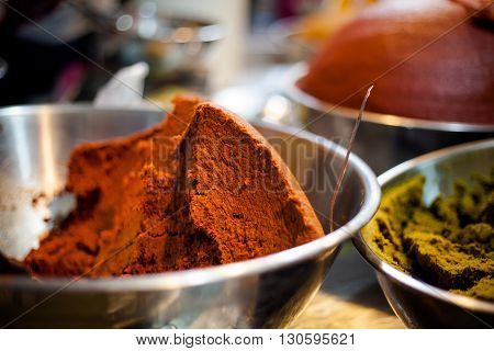 Fresh made red curry paste. Traditional thai market.
