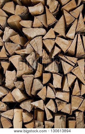 Firewood logs backgrond with wood logs for fire
