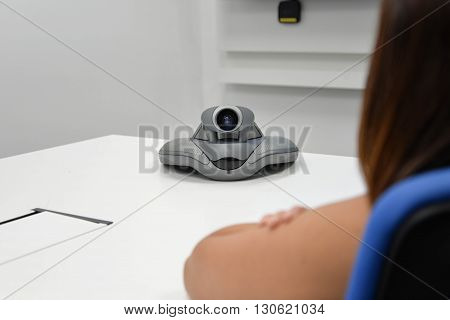Video conference device for long distance communication