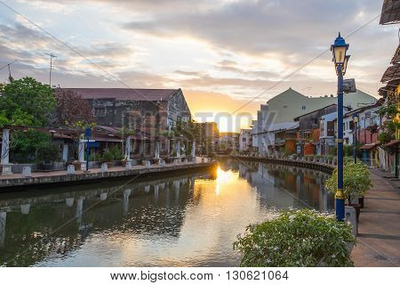 View of river house and riverwalk with sunrise in Malacca Malaysia.