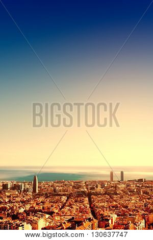 Barcelona a bird view over city at sunset / aerial view of Barcelona from Mediterranean. Catalonia Spain.
