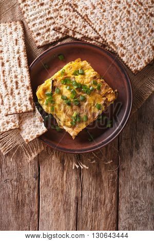 Matzah Brei With Green Onions Close-up On A Plate. Vertical Top View