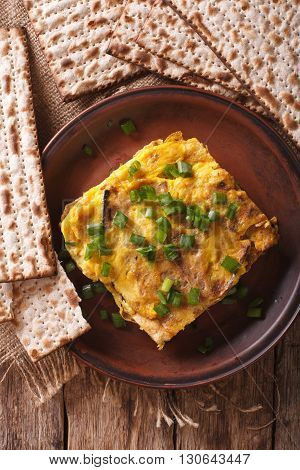 Jewish Breakfast: Matzah Brei With Green Onions Close-up. Vertical Top View