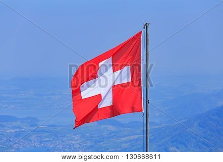 Flag of Switzerland on the top of Mt. Stanserhorn in the Swiss canton of Nidwalden.