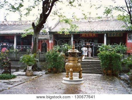 MACAU - CIRCA 1987: An urn stands in the courtyard of the Kun Iam Buddhist Temple in Macau.