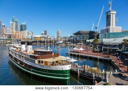 SYDNEY - MARCH 31: Darling Harbour adjacent to the city centre of Sydney is an area of entertainment facilities and a pedestrian walkway. March 31 2016 in Sydney Australia.