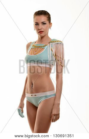Sexy go-go dancer in studio on a white background.