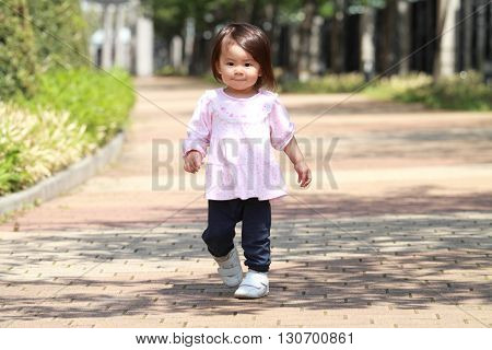 Japanese girl taking a walk (1 year old)