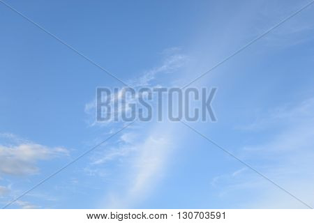 Blue sky with spindrift clouds may be used as background.