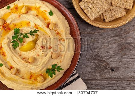 Hummus Dip with Olive Oil. Selective focus.