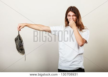 Man With Stinky Shoe